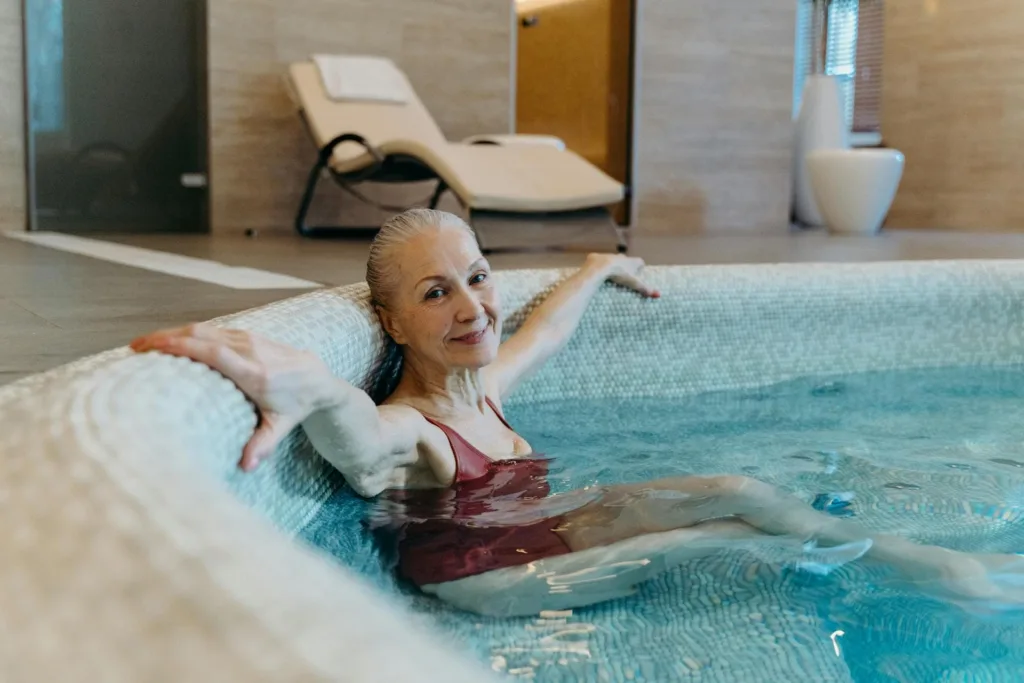 Senior woman relaxing in a hot tub