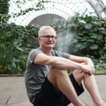 Portrait of a smiling man in a garden