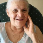 Portrait of an elderly woman as she smiles