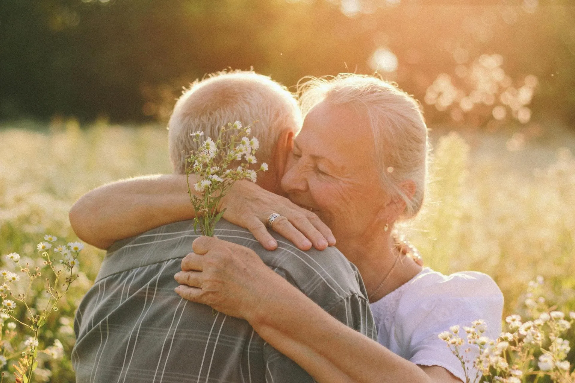 Elderly person smiling and looking content